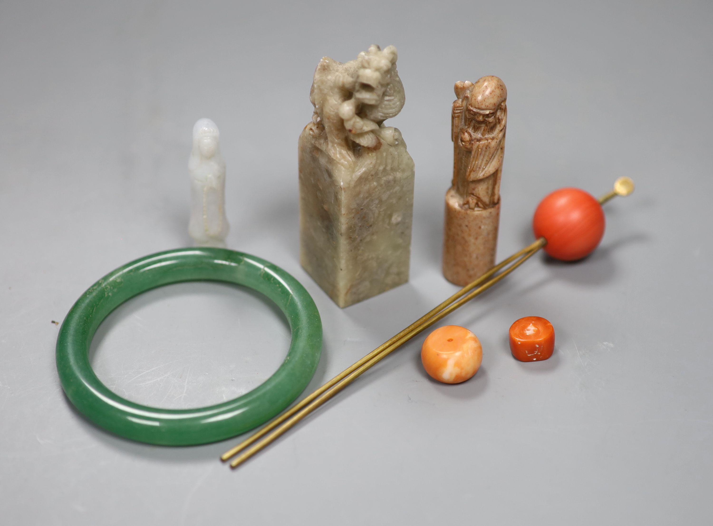 Chinese jades and corals: two seals, a bangle etc.
